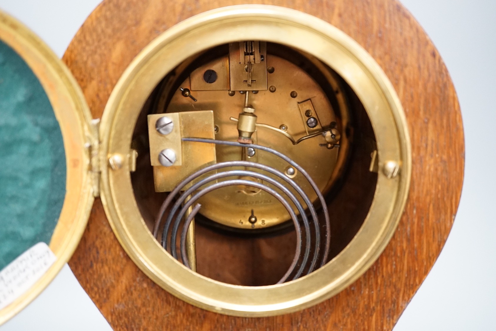 An Edwardian oak and marquetry balloon clock - 30cm tall